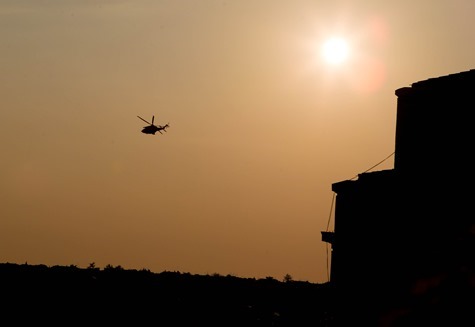 The helicopter carrying Pope Benedict lifts off over Vatican City State Feb. 28.  Pilot photo/Gregory L. Tracy