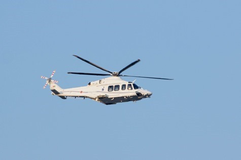 The helicopter carrying Pope Benedict XVI passes over The Pontifical North American College in Rome Feb. 28.  Pilot photo/Gregory L.  Tracy