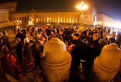 People gather in St. Peter's Square at 8 PM Feb. 28, the time when the Sede Vacante began.  Pilot photo/Gregory L.  Tracy