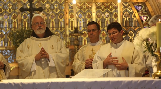 Fr. Darin Colarusso at the altar of the Church of the Transfiguration with Cardinal SeÃ¡n (George Martell/TheGoodCatholicLife.com)